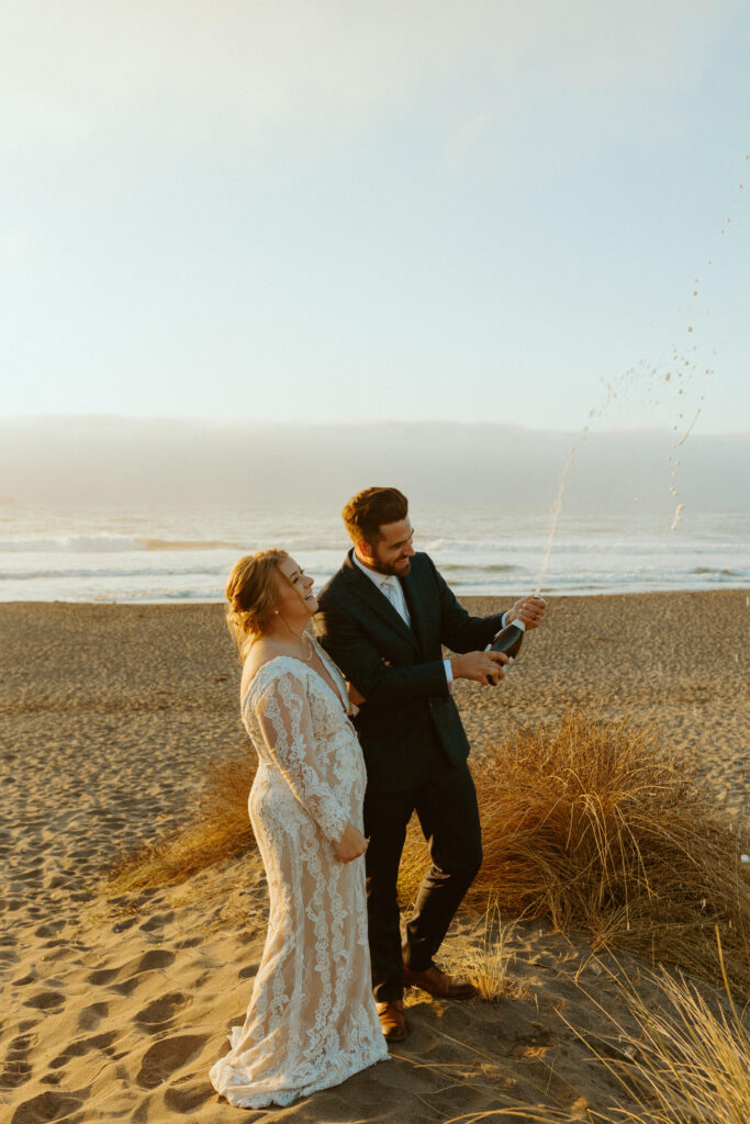 elopement couple champagne spray